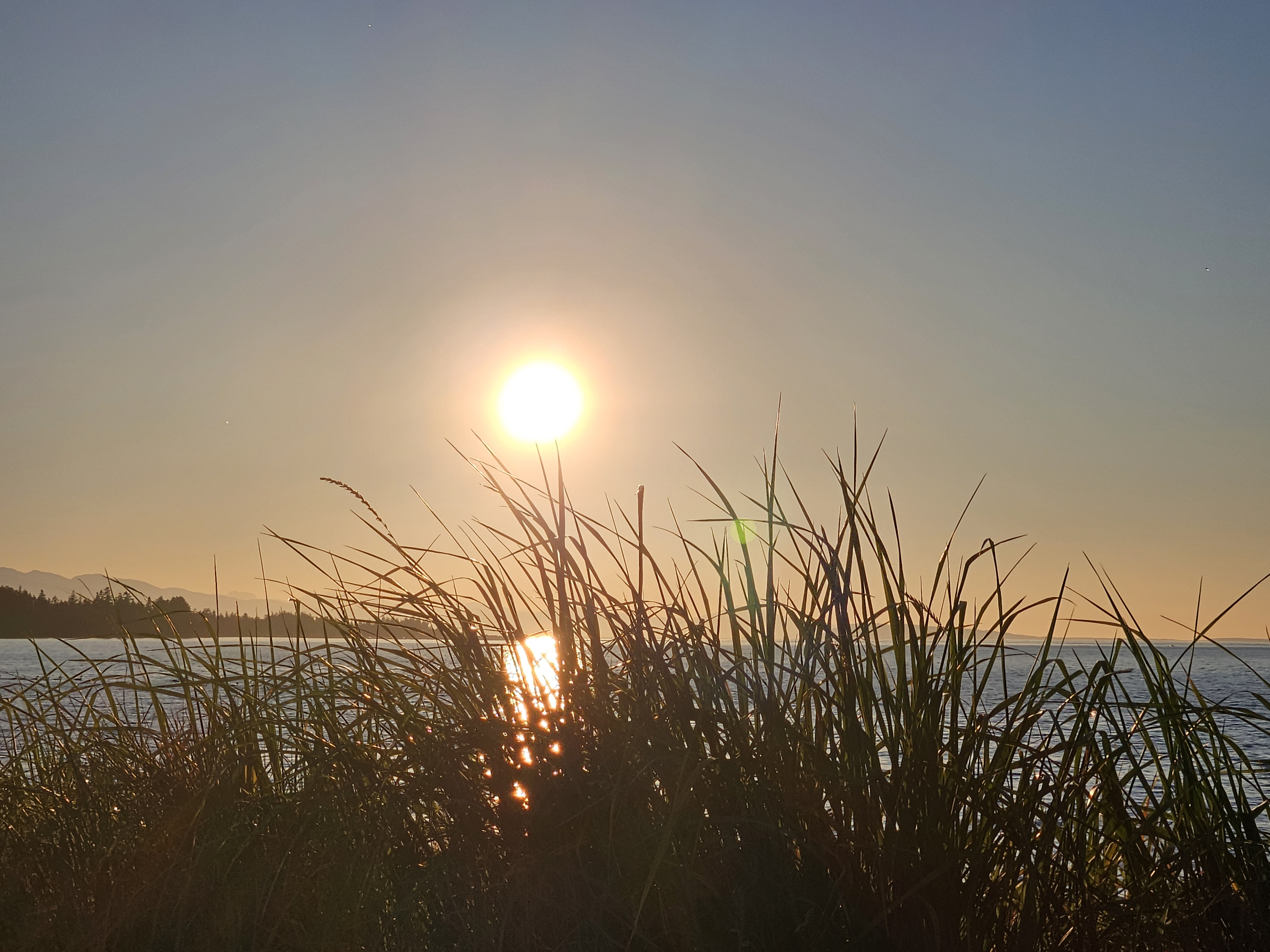 Summer sunset on the Parksville, BC beachfront over looking the ocean.